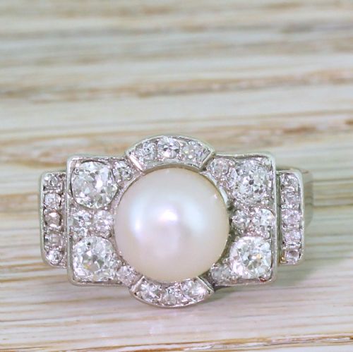 fig 1. Retro Natural Pearl & 1.18 Carat Old Cut Diamond Cluster Ring, circa 1950
