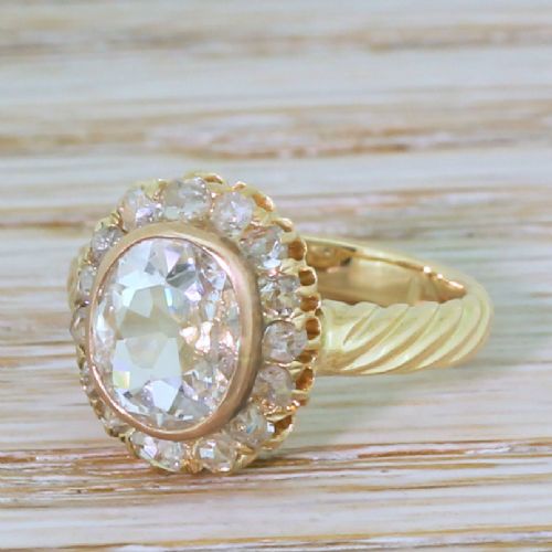 Mid Century 1.24 Carat Old Oval Cut Diamond Cluster Ring, Circa 1950

