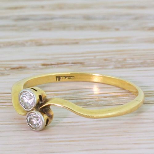Edwardian 0.20 Carat Old Cut Diamond Crossover Ring, Circa 1910
