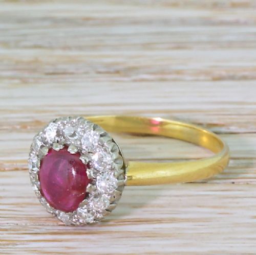 Mid Century 0.65 Carat Cabochon Ruby & Old Cut Diamond Cluster Ring, Circa 1950