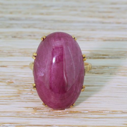 fig 1. Mid Century 26.80 Carat Cabochon Ruby Solitaire Ring, circa 1950