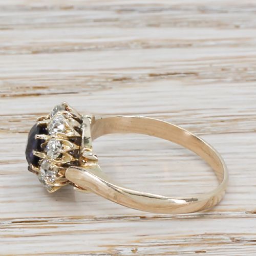 fig 2. Edwardian 0.81 Carat Purple Sapphire & Old Cut Diamond Cluster Ring, circa 1910