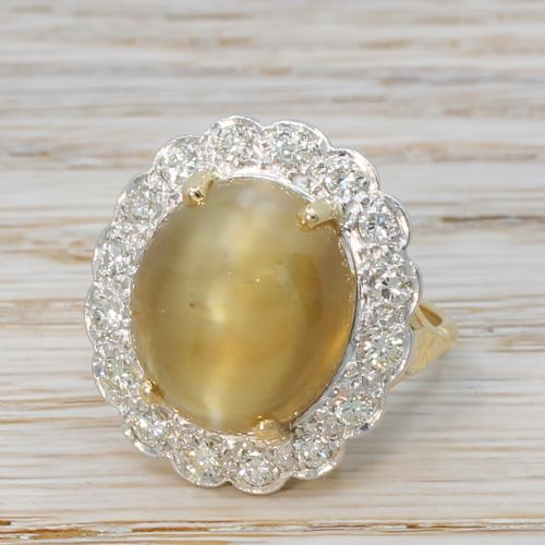 Mid Century 17.31 Carat Cat's Eye Chrysoberyl & Diamond Cluster Ring, Circa 1965