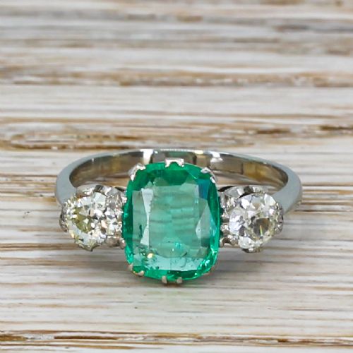 fig 1. Art Deco 1.05 Carat Emerald & 0.53 Carat Old Cut Diamond Trilogy Ring, circa 1925