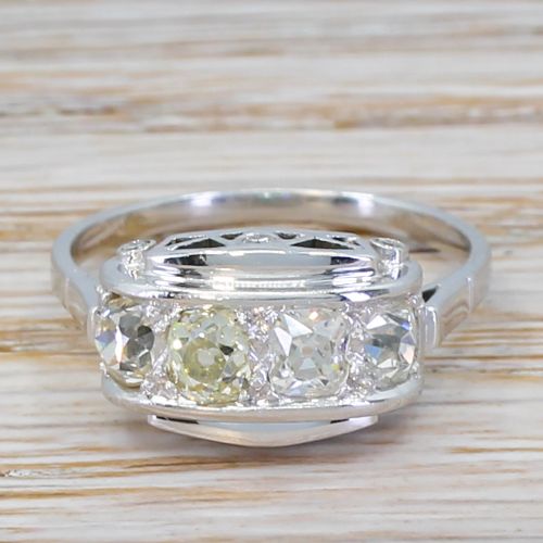 fig 1. Mid Century 0.97 Carat Diamond Four Stone Ring, circa 1950