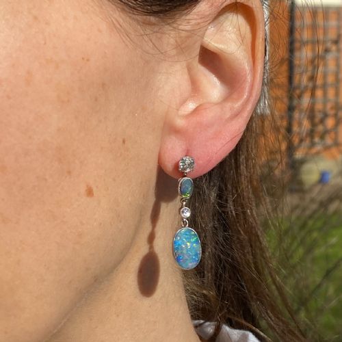 fig 1. Mid Century 1.50 Carat Black Opal & 0.91 Carat Diamond Drop Earrings, circa 1960