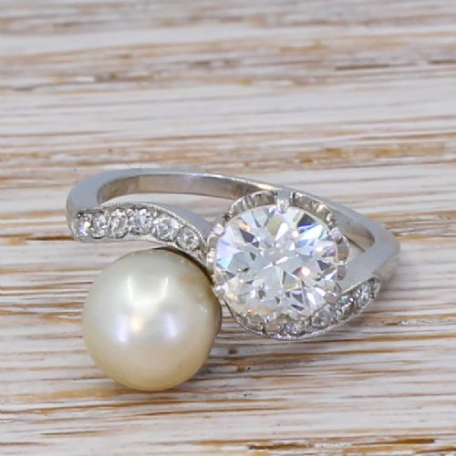 fig 1. Art Deco 1.11 Carat Old Cut Diamond & Natural Pearl Crossover Ring, circa 1915