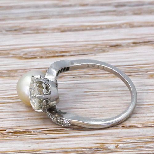 fig 2. Art Deco 1.11 Carat Old Cut Diamond & Natural Pearl Crossover Ring, circa 1915