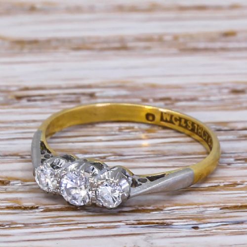 Mid Century 0.25 Carat Round Brilliant Cut Diamond Trilogy Ring, Circa 1965
