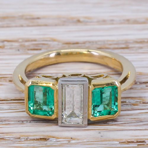 fig 1. Modernist 0.65 Carat Baguette Cut Diamond & Emerald Trilogy Ring, circa 1960