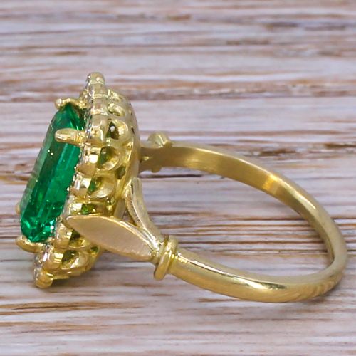 fig 2. Edwardian 1.42 Carat Colombian Emerald & Diamond Cluster Ring, circa 1910