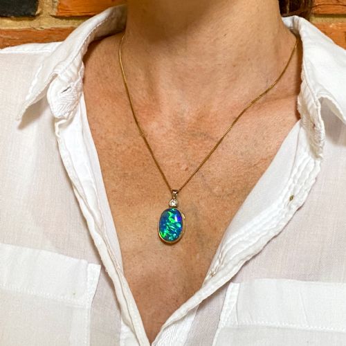 fig 1. Mid Century 10.75 Carat Black Opal & Diamond Pendant, circa 1950