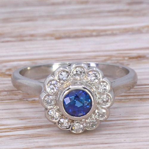 fig 1. Mid Century 0.45 Carat Sapphire & 0.30 Carat Diamond Target Cluster Ring, circa 1950