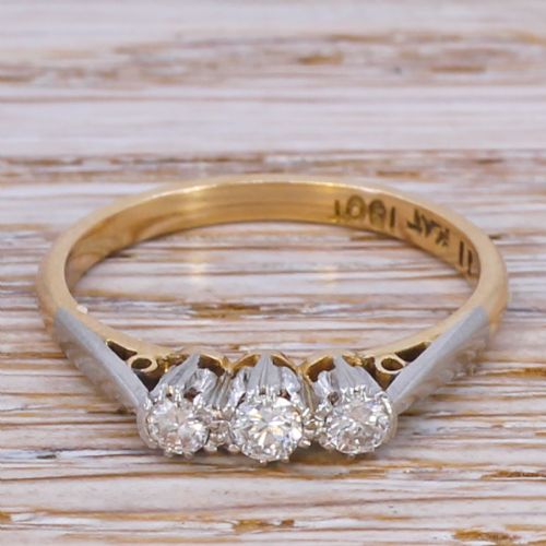 fig 1. Mid Century 0.20 Carat Brilliant Cut Diamond Trilogy Ring, circa 1960