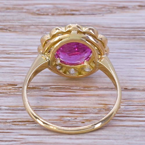 fig 3. Edwardian 4.22 Carat Natural Pink Sapphire & Diamond Cluster Ring, circa 1910