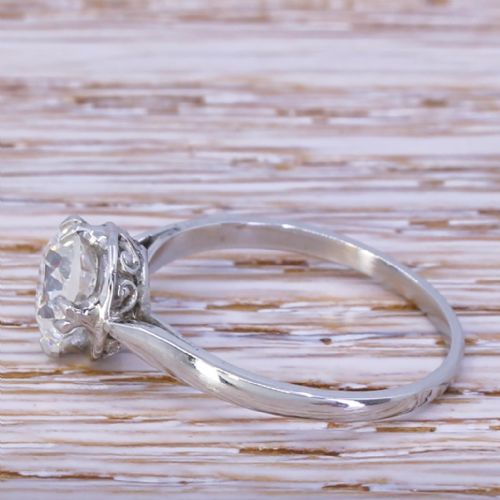 fig 2. An Art Deco platinum solitaire ring featuring a round old European cut diamond secured in a claw setting.