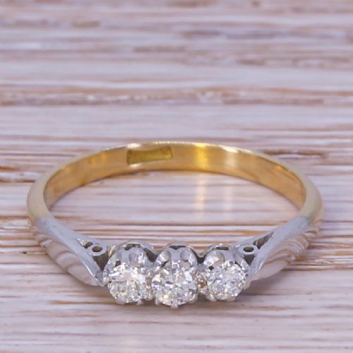 fig 1. Mid Century 0.24 Carat Transitional Cut Diamond Trilogy Ring, circa 1960