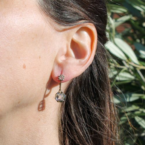 fig 1. A pair of Art Deco diamond drop earrings featuring rose cut diamonds set in a linear articulated design.