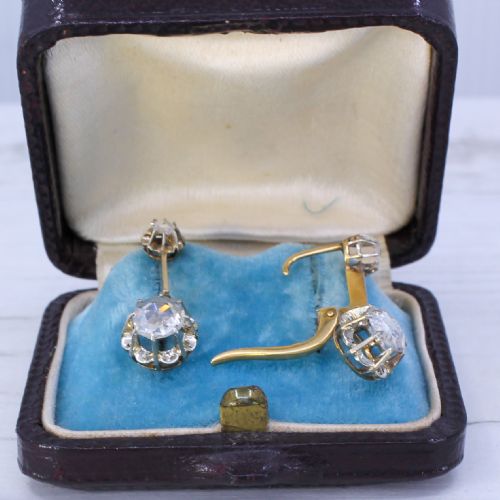 fig 2. A pair of Art Deco diamond drop earrings featuring rose cut diamonds set in a linear articulated design.