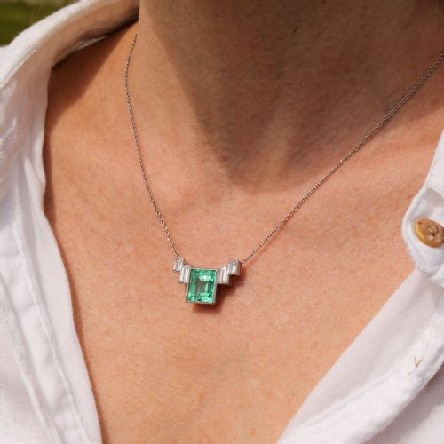fig 1. Art Deco 5.70 Carat Minor Oil Emerald & Diamond Pendant, circa 1930