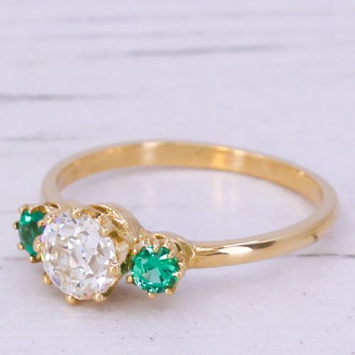 Art Deco 0.65 Carat Old Cut Diamond & 0.20 Carat Emerald Trilogy Ring, Circa 1920