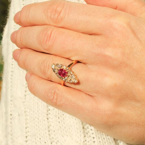 fig 1. A late Victorian yellow gold navette cluster ring set with a central oval ruby surrounded by old cut diamonds.