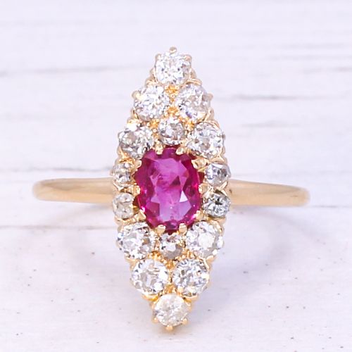 fig 2. A late Victorian yellow gold navette cluster ring set with a central oval ruby surrounded by old cut diamonds.