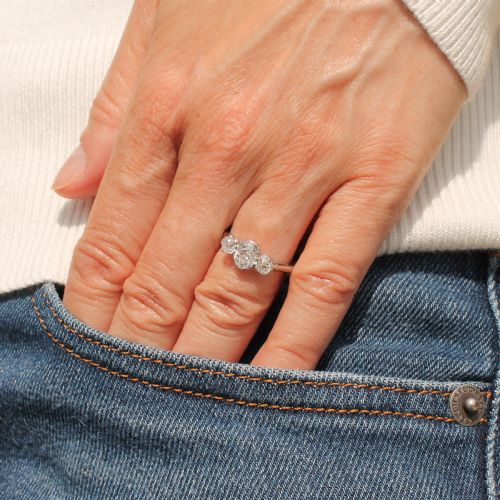 fig 1. An Art Deco platinum ring set with three old-cut diamonds in a horizontal trilogy configuration.