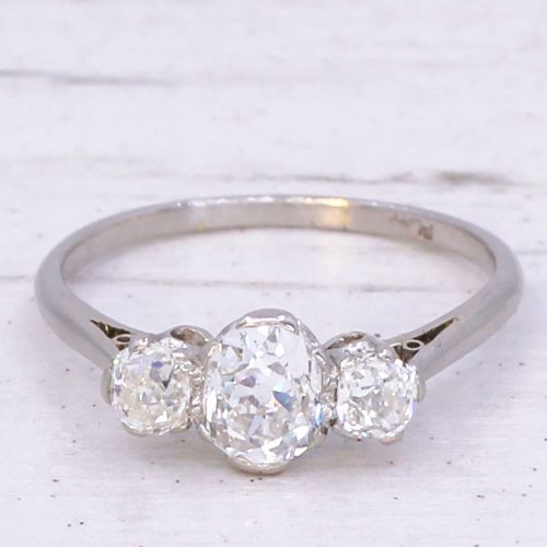 fig 2. An Art Deco platinum ring set with three old-cut diamonds in a horizontal trilogy configuration.