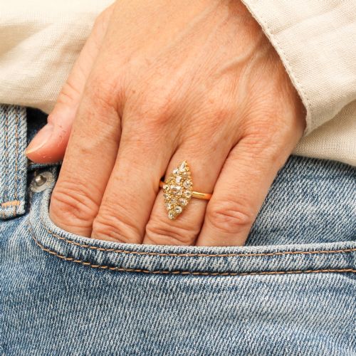 fig 1. A Victorian yellow gold ring featuring a pointed marquise-shaped cluster set with multiple old-cut diamonds.