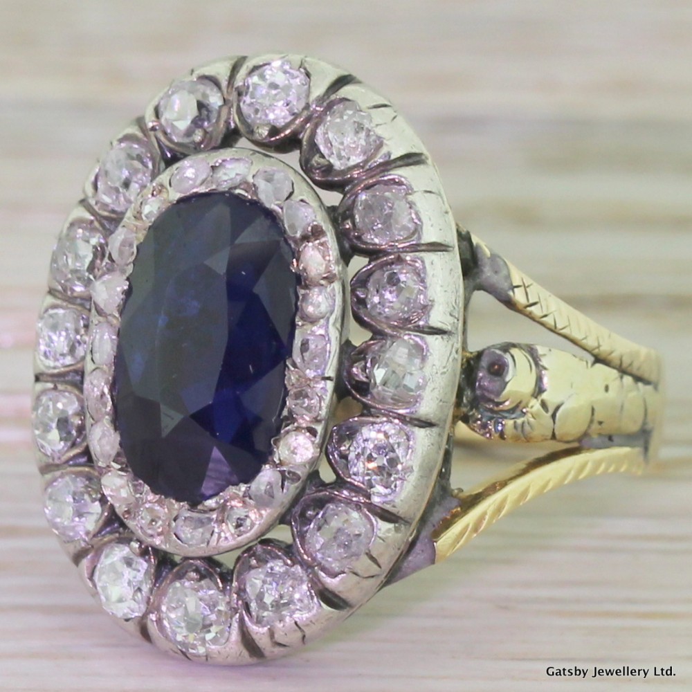 Georgian 2.75 Carat Sapphire & Old Cut Diamond Double Cluster Ring, circa 1800
