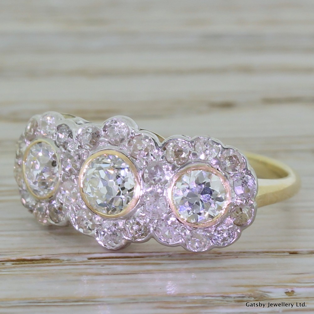 Art Deco 1.72 Carat Old Cut Diamond Triple Cluster Ring, circa 1920
