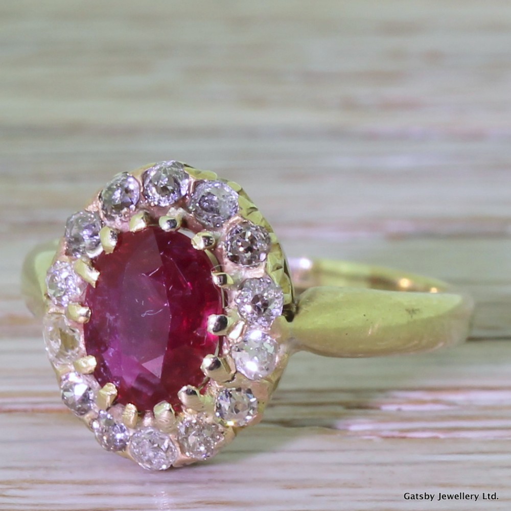 Victorian 1.25 Carat Ruby & 0.45 Carat Old Cut Diamond Cluster Ring, circa 1900
