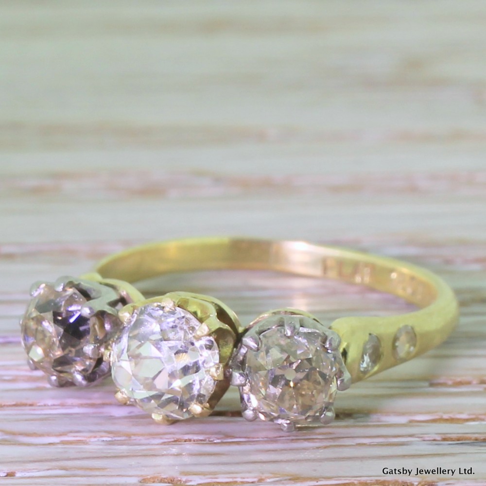 Art Deco 2.93 Carat Fancy Yellow & Cognac Old Cut Diamond Trilogy Ring, circa 1920
