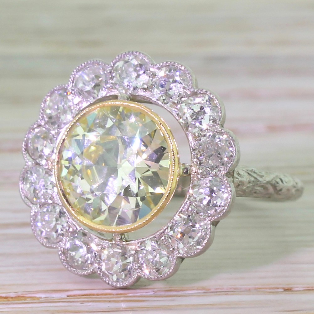 Art Deco 4.50 Carat Fancy Yellow & White Old Cut Diamond Cluster Ring, circa 1920
