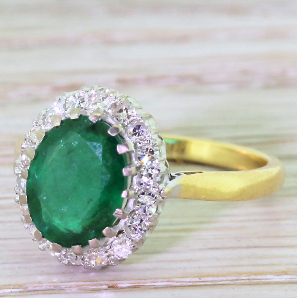 Mid Century 2.00 Carat Emerald & Diamond Cluster Ring, circa 1950
