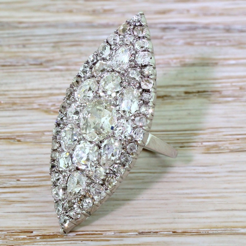 Art Deco 6.85 Carat Old Cut Diamond Navette Cluster Ring, circa 1925
