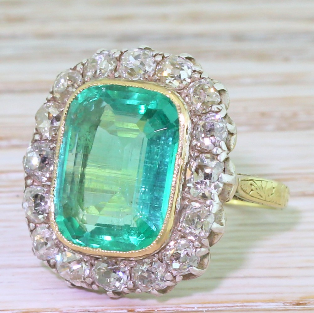 Edwardian 6.00 Carat Minor Oil Colombian Emerald & Old Cut Diamond Ring, circa 1910
