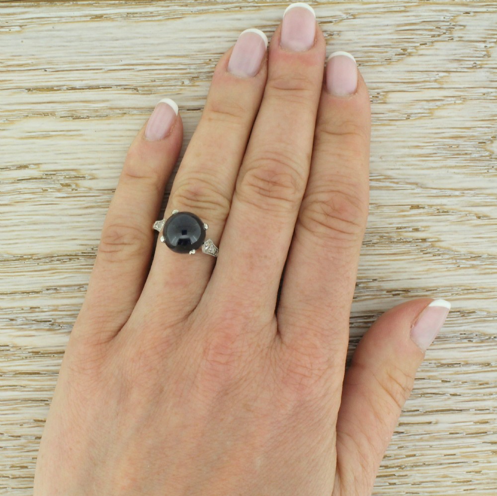 Art Deco 5.14 Carat Cabochon Sapphire Solitaire Ring, circa 1925
 View V