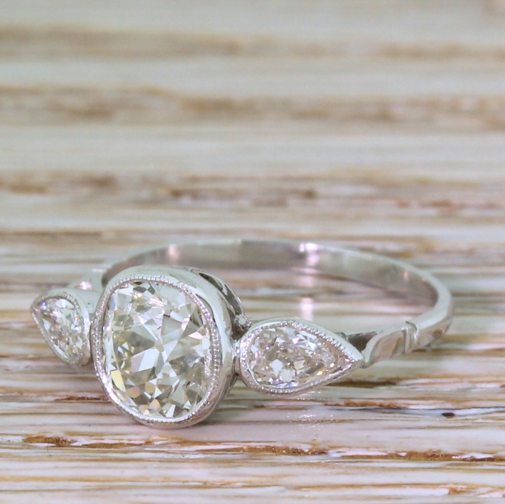 Art Deco 1.90 Carat Old Cushion & Old Pear Cut Diamond Trilogy Ring, circa 1930
