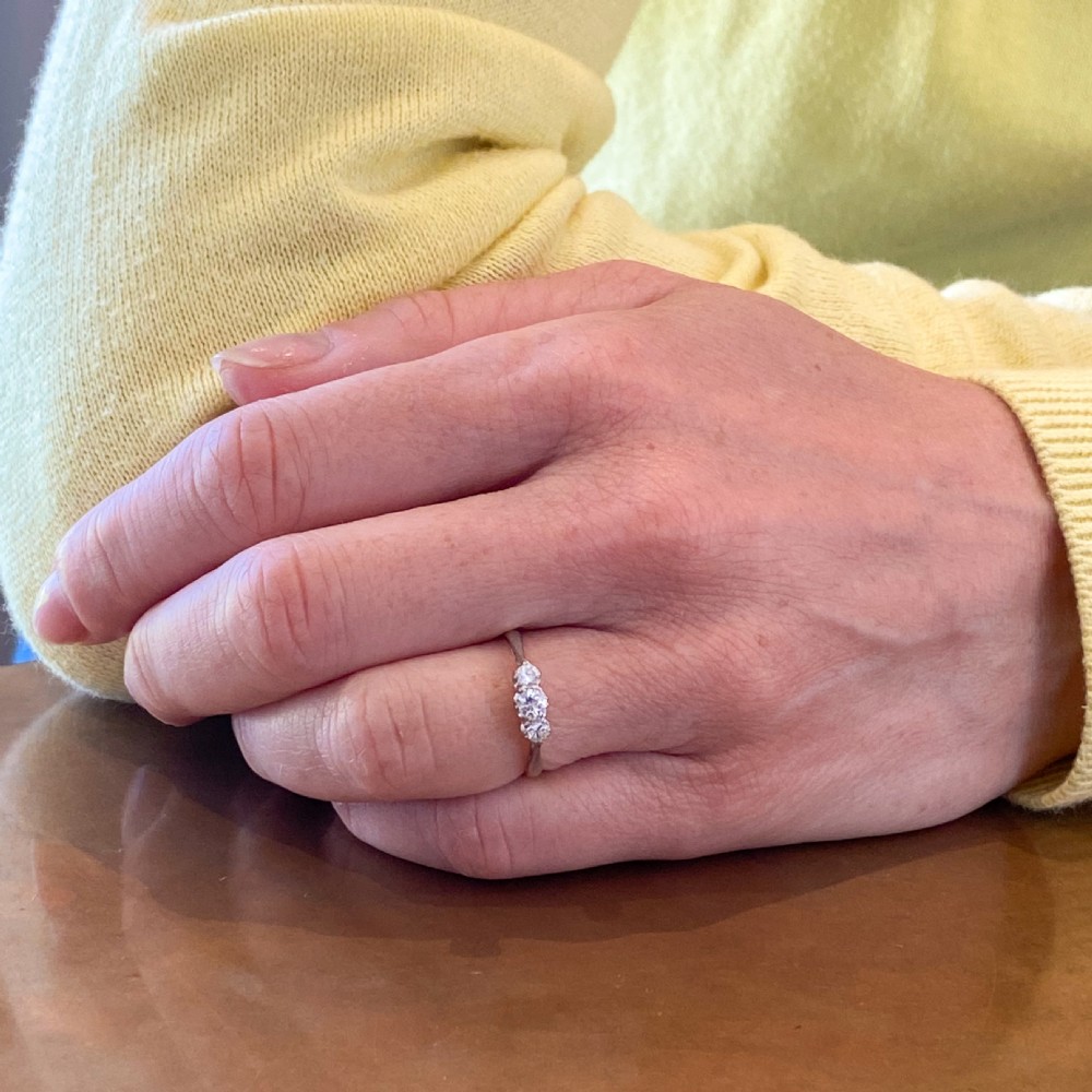 Mid Century 0.25 Carat Round Brilliant Cut Diamond Trilogy Ring, circa 1965 View VII
