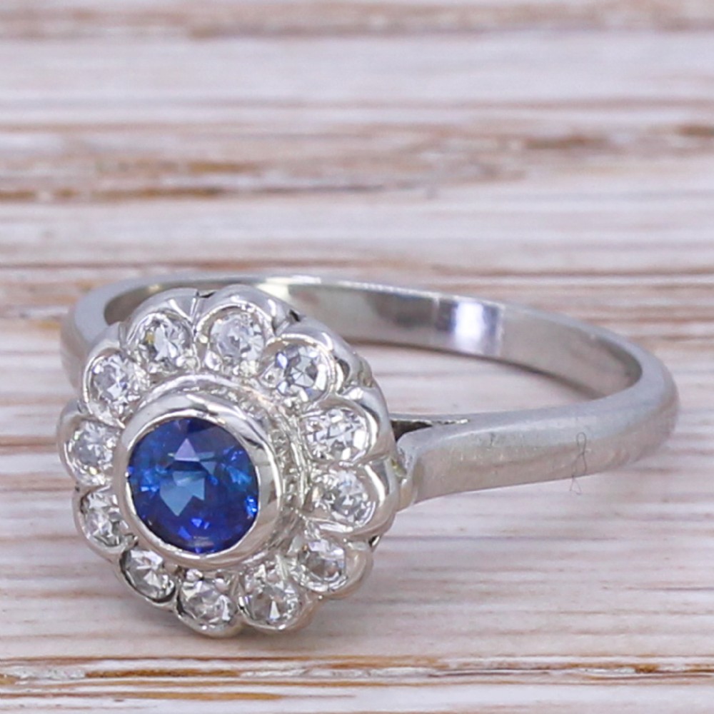 Mid Century 0.45 Carat Sapphire & 0.30 Carat Diamond Target Cluster Ring, circa 1950