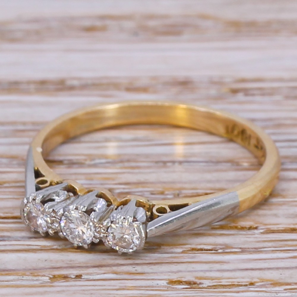 Mid Century 0.20 Carat Brilliant Cut Diamond Trilogy Ring, circa 1960