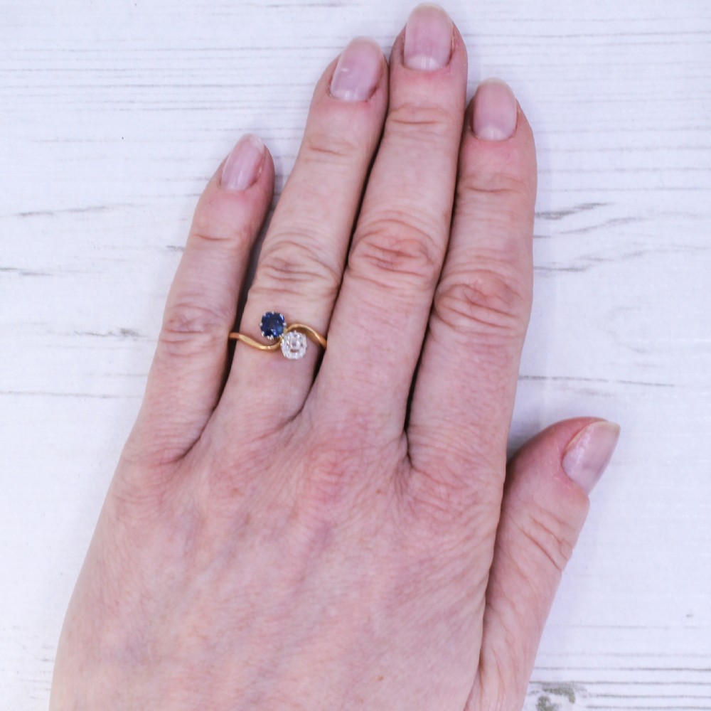 Edwardian 0.51 Carat Sapphire & 0.50 Carat Diamond Crossover Ring, circa 1905 View VII