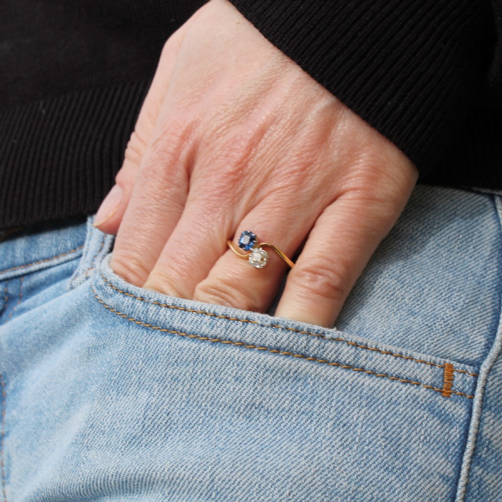 Edwardian 0.51 Carat Sapphire & 0.50 Carat Diamond Crossover Ring, circa 1905 View IX