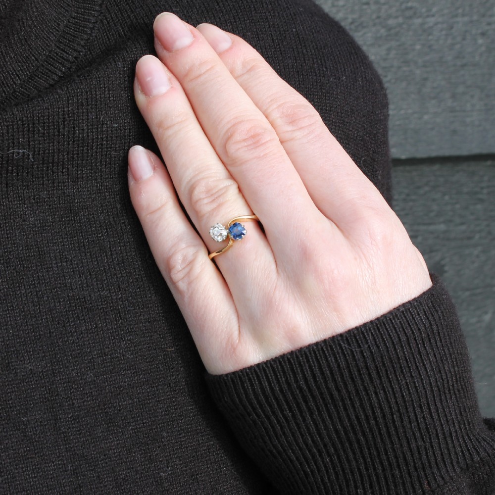 Edwardian 0.51 Carat Sapphire & 0.50 Carat Diamond Crossover Ring, circa 1905 View X
