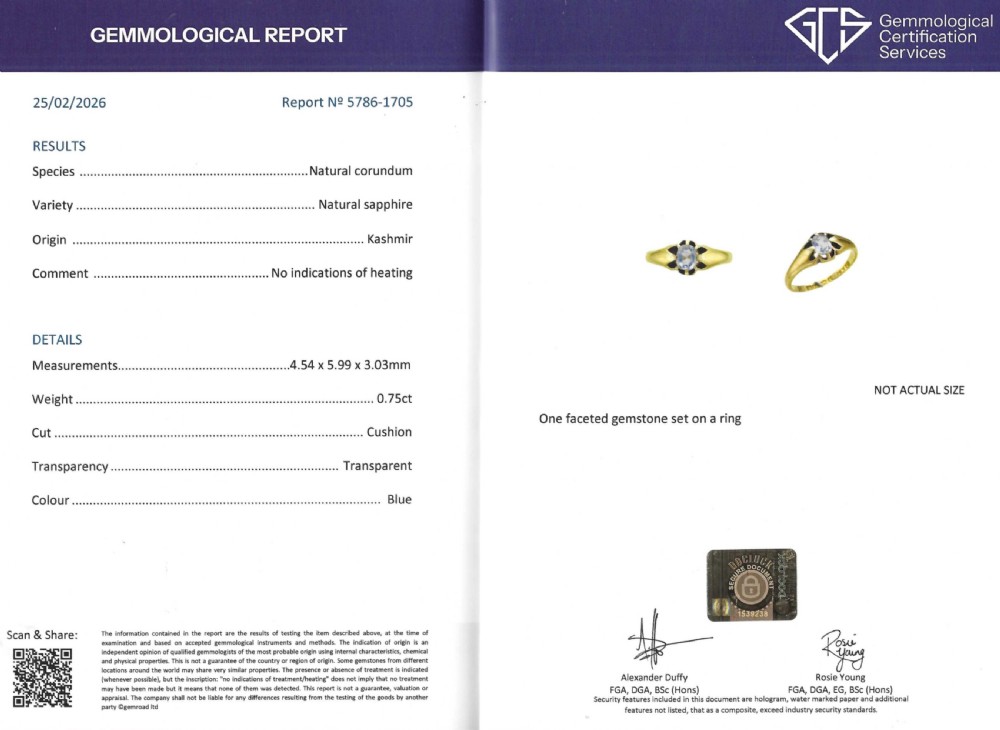 An antique yellow gold ring featuring a central oval pale blue sapphire set in claw mountings with hallmarks engraved inside the band. View VIII