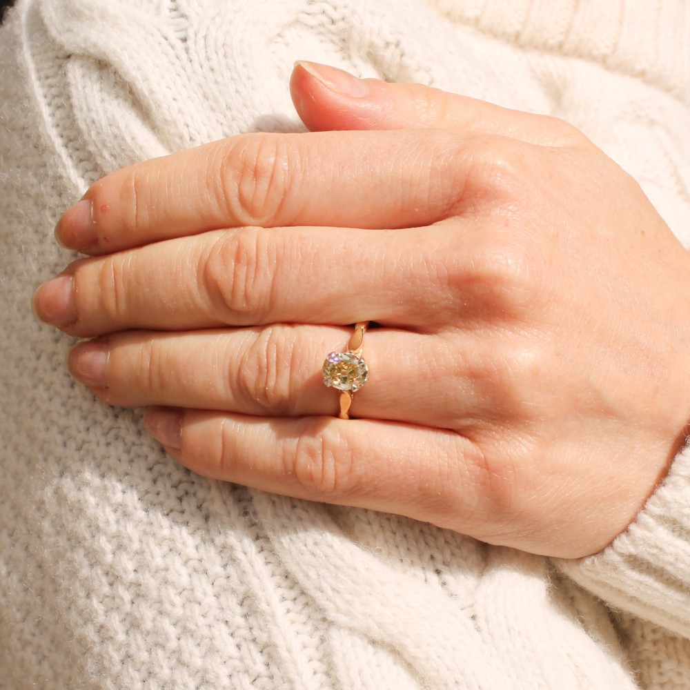 Art Deco 1.20 Carat Fancy Orangy Yellow Old Oval Cut Diamond Ring, circa 1920 View VI