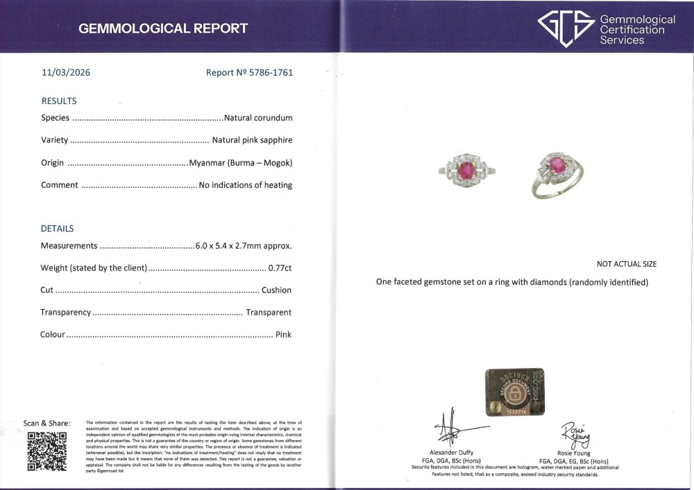 An Art Deco platinum ring featuring an oval pink sapphire in a four-claw setting surrounded by a geometric halo of diamonds with milgrain detail. View VIII