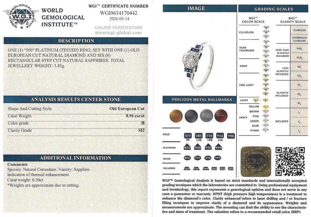 A platinum ring featuring a central round old cut diamond flanked by stepped calibre-cut blue sapphires. View VIII